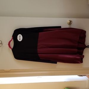 Two tone, dual fabric dress with balloon bottom.